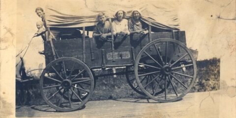 Vintage car with family inside