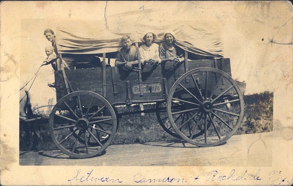 Vintage car with family inside